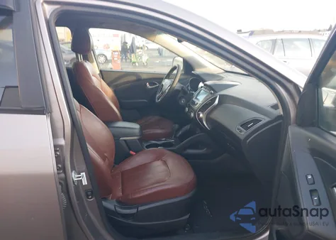 2012 Hyundai Tucson Limited z USA, uszkodzony, nr VIN KM8JU3AC7CU522152